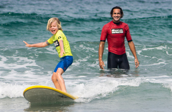 Learning to surf at The Watersports Camp