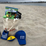 bag filled with goodies on beach